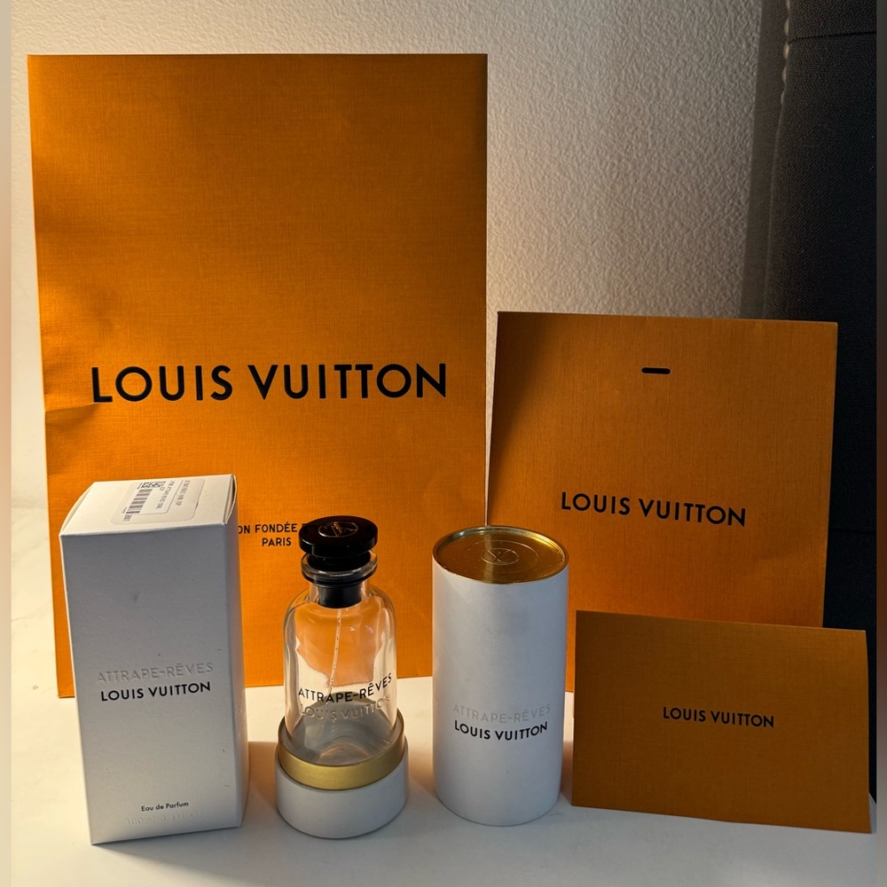 Empty Louis Vuitton Attrape-Rêves 100mL bottle with original packaging